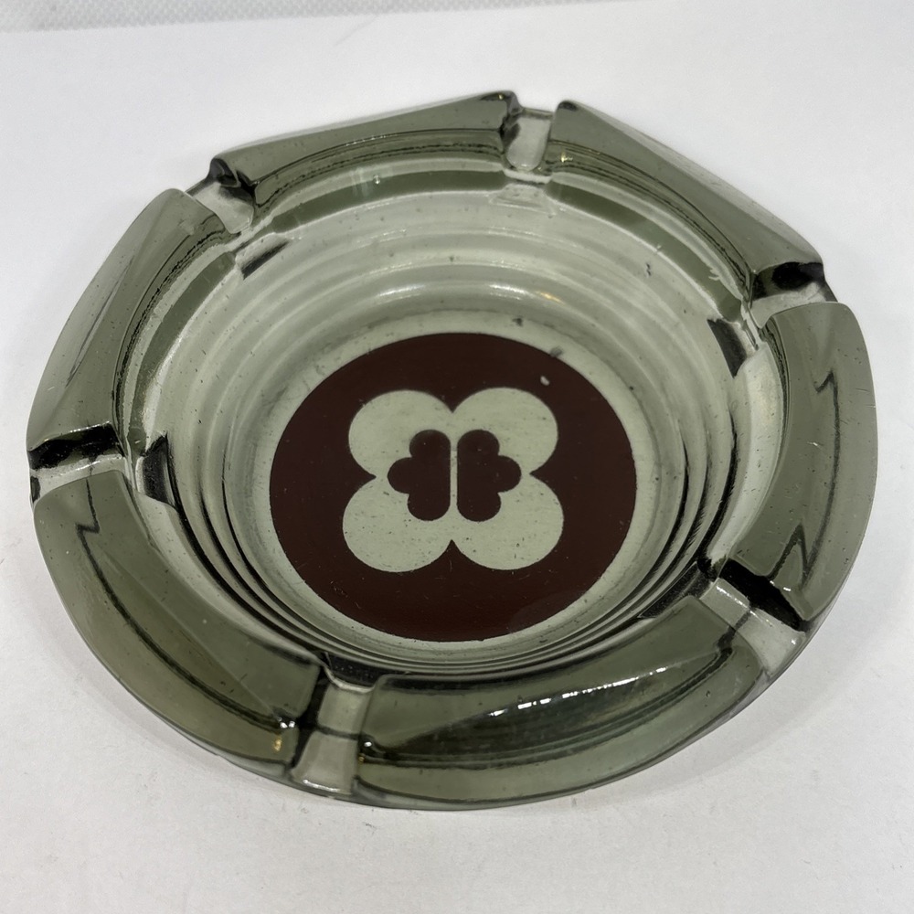 Vtg Glass Cigarette Cigar Ashtray Round Smokey Green Brownish Orange Flower Logo